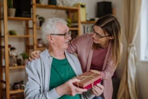 Family visiting senior at home